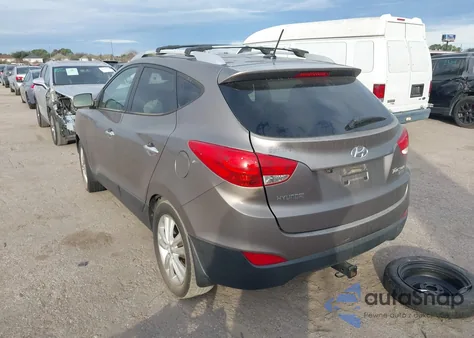 2012 Hyundai Tucson Limited z USA, uszkodzony, nr VIN KM8JU3AC1CU530974